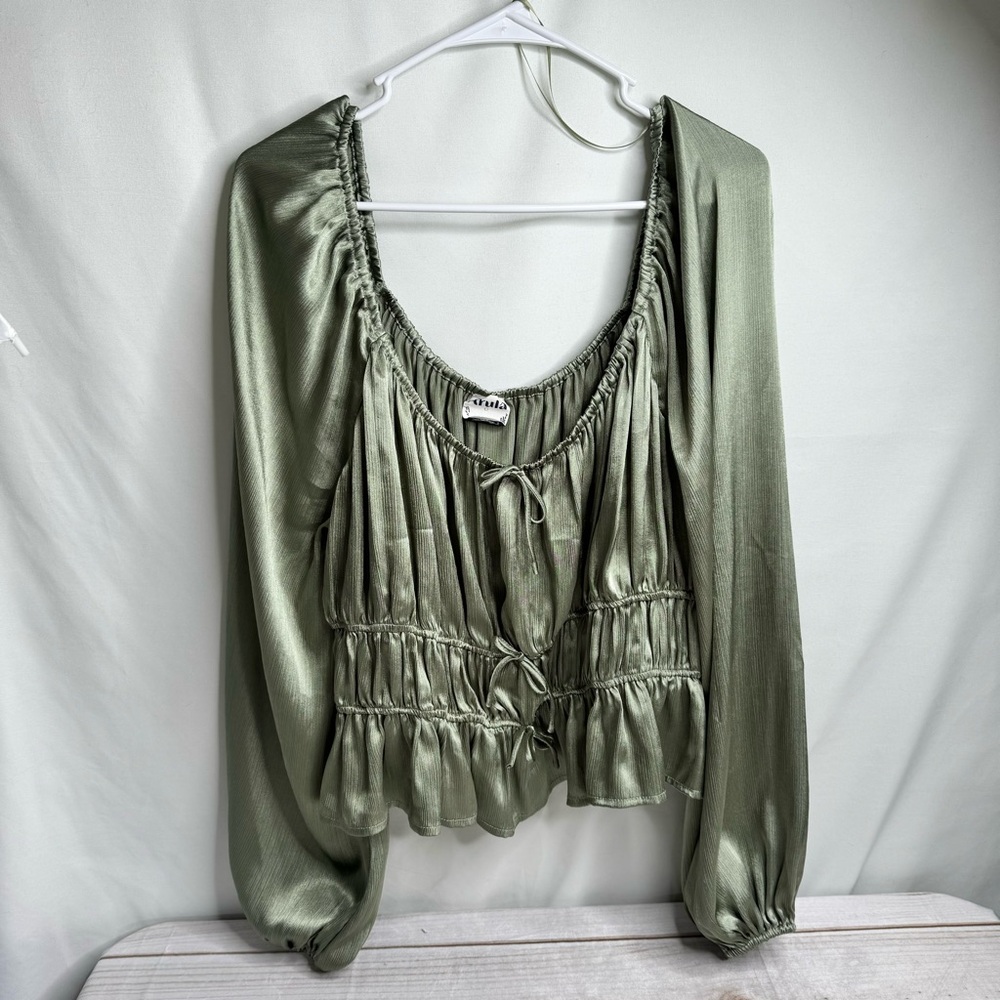Arula green long sleeve babydoll blouse.